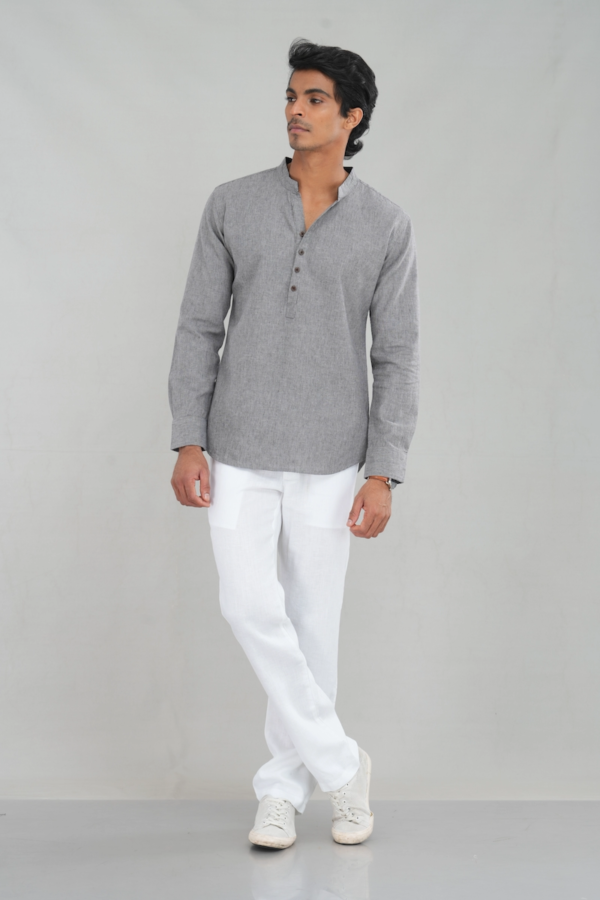 A model wearing an ash grey kurta shirt made of a linen-cotton blend, featuring long sleeves, a band collar, and buttoned placket, perfect for casual ethnic wear or everyday styling.