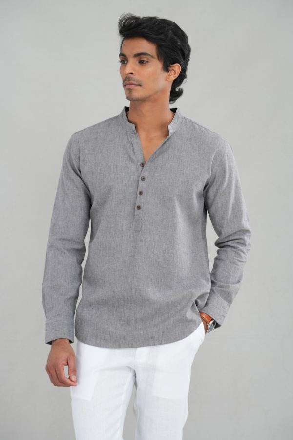 A model wearing an ash grey kurta shirt made of a linen-cotton blend, featuring long sleeves, a band collar, and buttoned placket, perfect for casual ethnic wear or everyday styling.