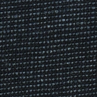 Man wearing charcoal black casual linen shorts with red stitching detail. by tropic of linen