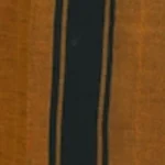 Man wearing a mustard brown handloom cotton sarong with two wide vertical black stripes.