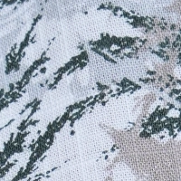 Close-up of a men's cotton Mandarin collar short sleeve shirt with a light grey base and green botanical print, featuring coconut buttons.