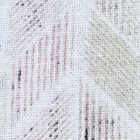 Man wearing a light multi-color chevron print Cuban collar short sleeve shirt with coconut buttons.