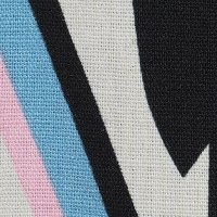 Close-up of a men's linen cotton blend Cuban collar short sleeve shirt with a cream base and a black, blue, and pink abstract geometric print, showing coconut buttons.