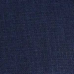 Man wearing a deep navy blue linen short sleeve shirt with double placket and chest pocket.