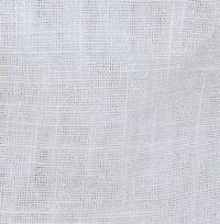 Young girl wearing classic white linen cargo jogger pants with an elasticated drawstring waist and side cargo pockets.