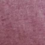 Young girl wearing heathered raspberry red linen-cotton blend cargo jogger pants with a drawstring waist and side cargo pockets.