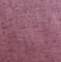 Young girl wearing heathered raspberry red linen-cotton blend cargo jogger pants with a drawstring waist and side cargo pockets.