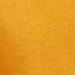 Young girl wearing marigold yellow linen cargo jogger pants with an elasticated drawstring waist and large side pockets, the cargo pocket and elasticated ankle cuff on a girl's marigold yellow linen pants.