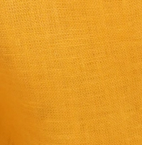 Young girl wearing marigold yellow linen cargo jogger pants with an elasticated drawstring waist and large side pockets, the cargo pocket and elasticated ankle cuff on a girl's marigold yellow linen pants.