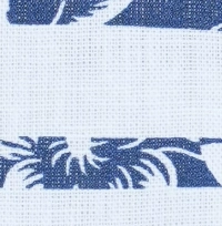 Woman wearing a white and blue floral stripe print cotton crop top, featuring a high neckline and a full button-back closure.