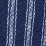 Woman wearing an indigo blue and white striped linen-cotton blend cami romper with side pockets.