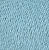 Woman wearing light turquoise linen-cotton blend wide-leg culottes with a high side slit, showcasing movement, the elegant high side slit detail on light turquoise wide-leg cropped pants.