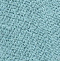 Woman wearing a knee-length seafoam green linen button-front cami dress with side pockets. green linen dress showing adjustable straps and elasticated back panels for a comfortable fit.