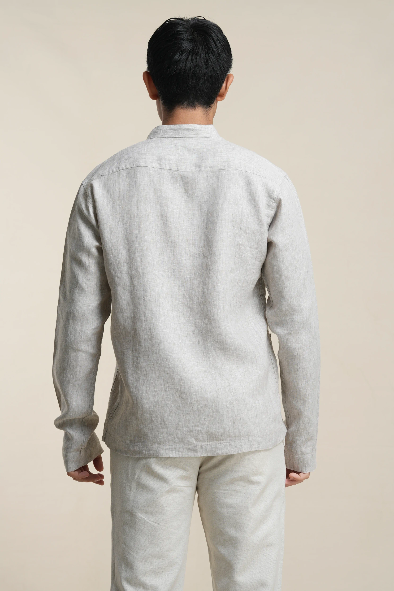 Men's linen chore jacket in Beige, back view displaying relaxed fit and structure — Tropic of Linen BE0058