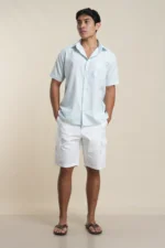 Men's short sleeve shirt in dusty blue melange front-facing view — Tropic of Linen BL0158