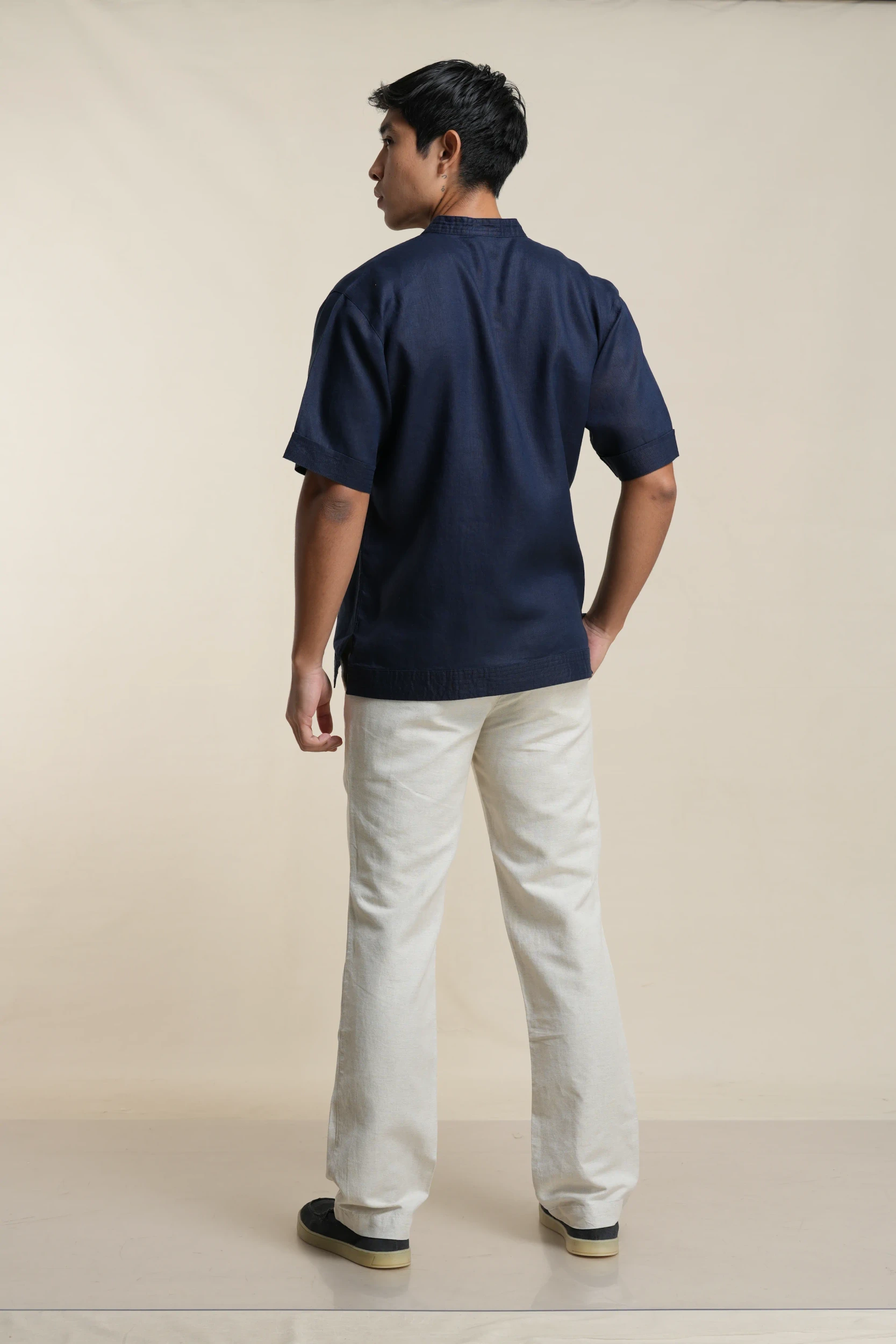 Men's short sleeve linen shirt in Navy Blue back view — Tropic of Linen BL0190