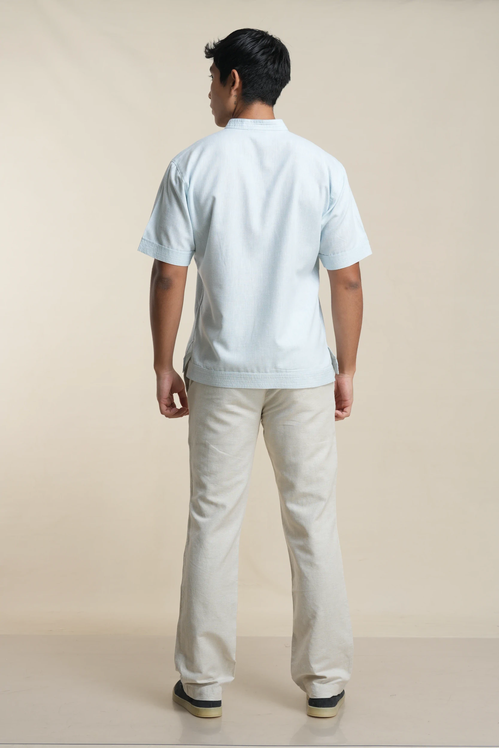 Men's short sleeve linen shirt in Light Blue back view — Tropic of Linen BL0168