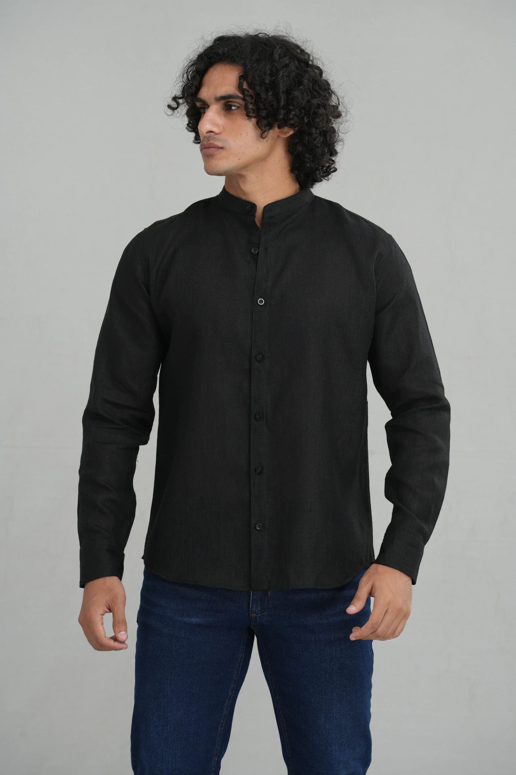 Men's mandarin collar shirt in black linen side profile view — Tropic of Linen BLK046