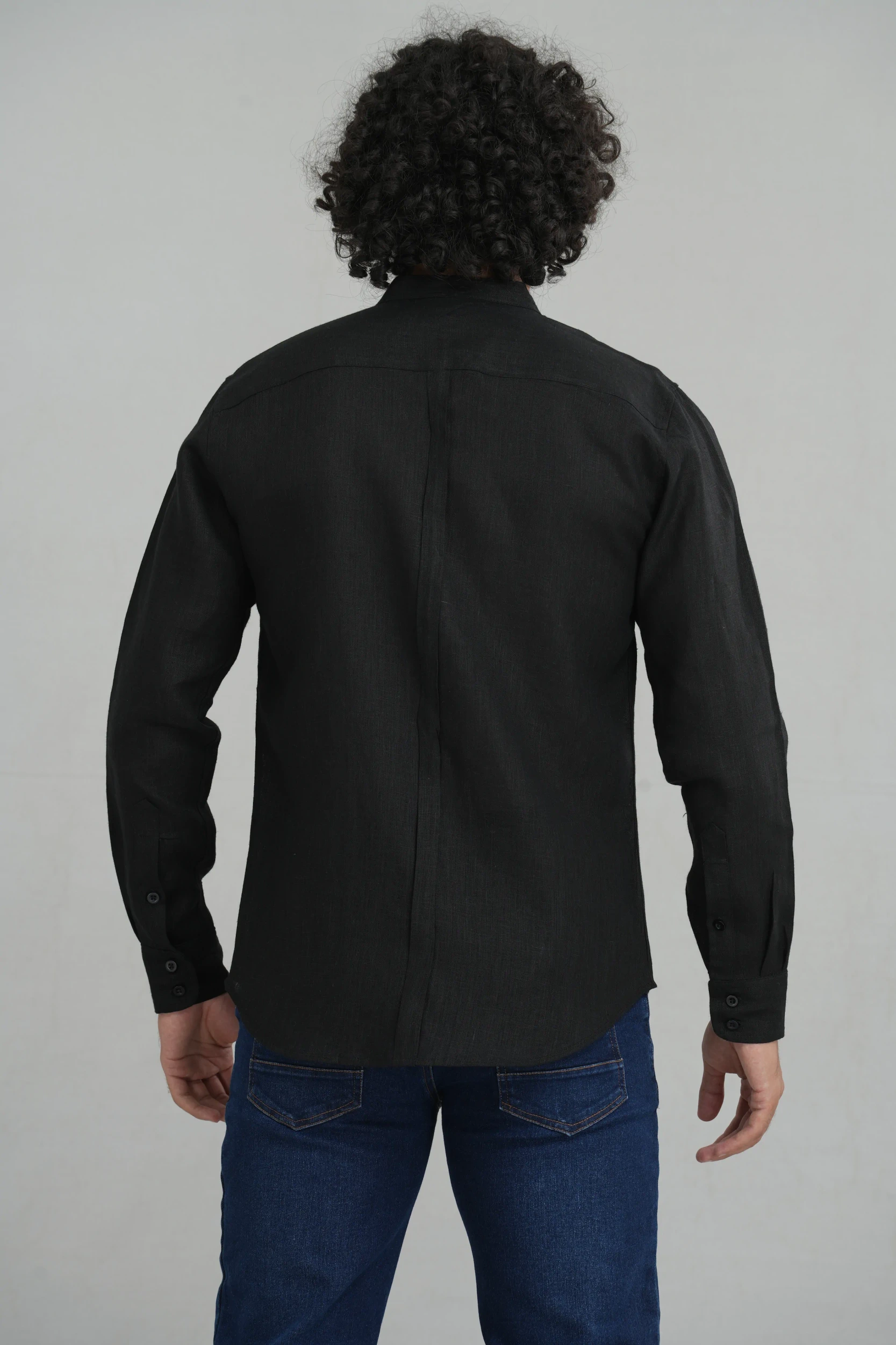 Men's mandarin collar shirt in black linen back view detail — Tropic of Linen BLK046