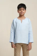 Boys' long sleeve kurta in sky blue linen with notch neckline, relaxed fit, paired with beige trousers on model