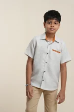 Boys' linen short sleeve shirt in Beige, front view with chest pocket detail — Tropic of Linen BE0060