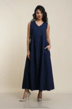 Navy blue sleeveless maxi dress in 100% linen, V-neck design with gathered waist and side pockets, full-length elegant fit