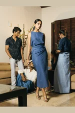 Women's wrap skirt in dark blue melange, front view in lifestyle setting — Tropic of Linen BL0155